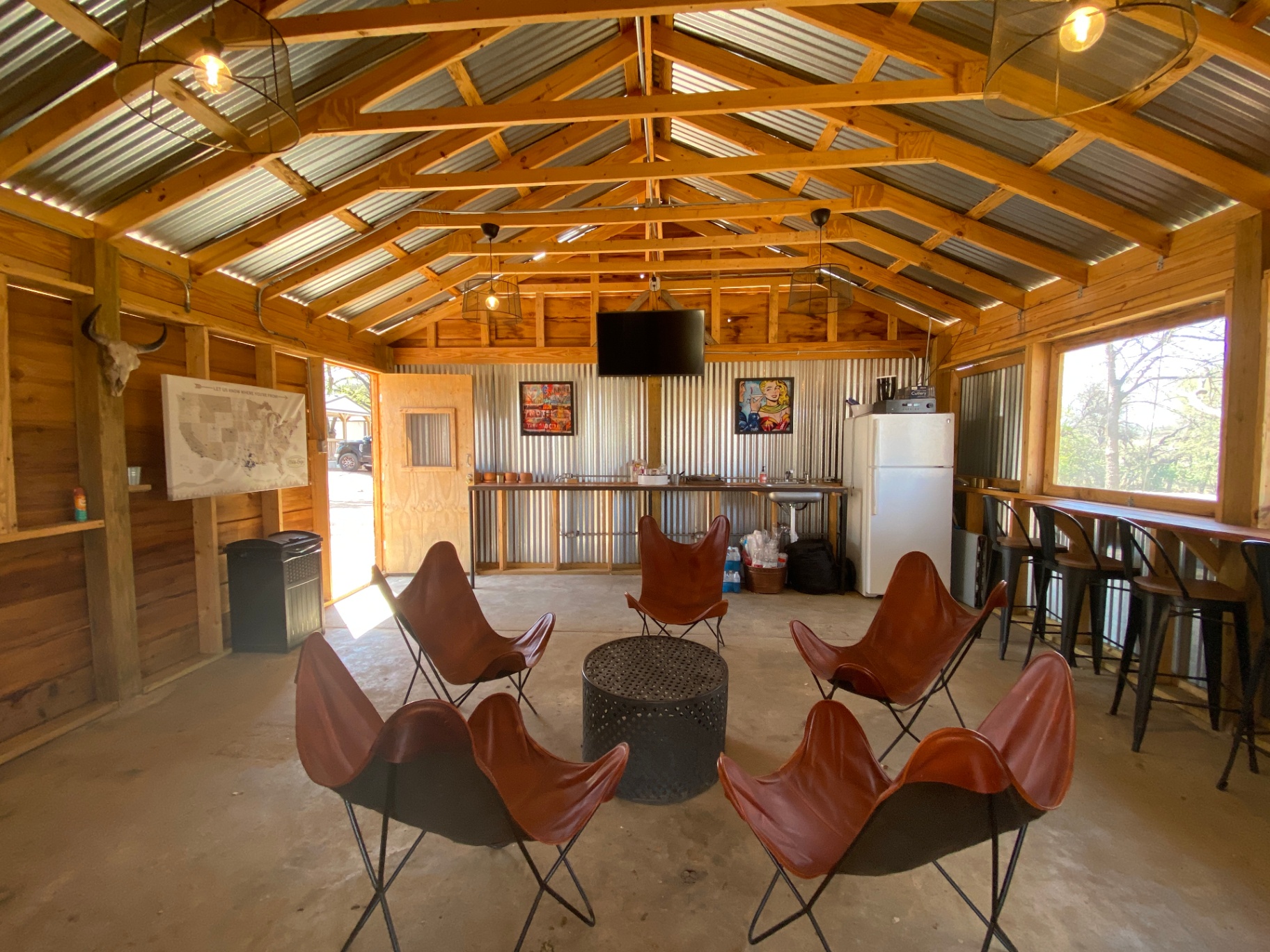 Inside The Barn — leather butterfly chairs & bar
