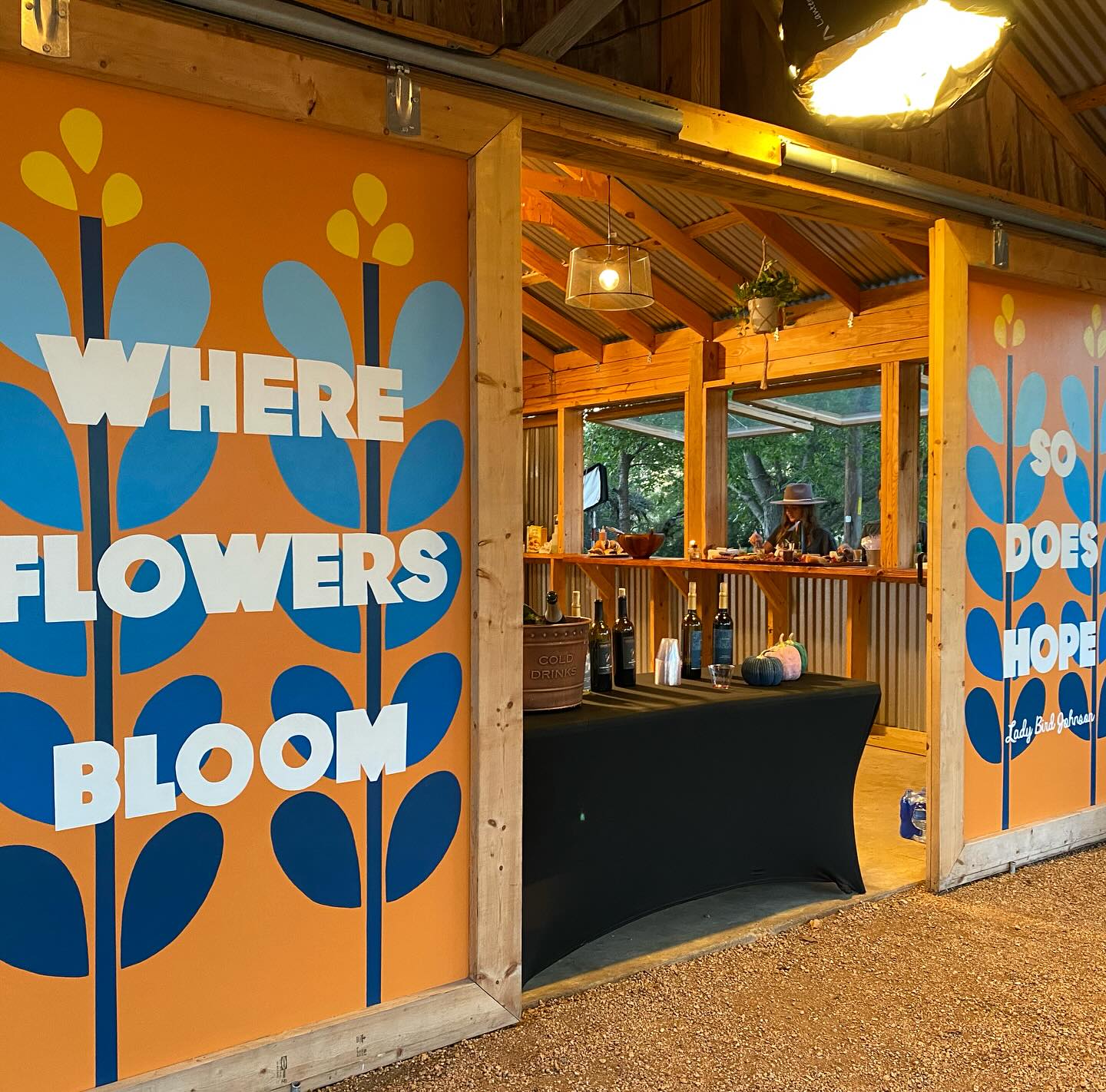 "Where Flowers Bloom" bar at The Barn