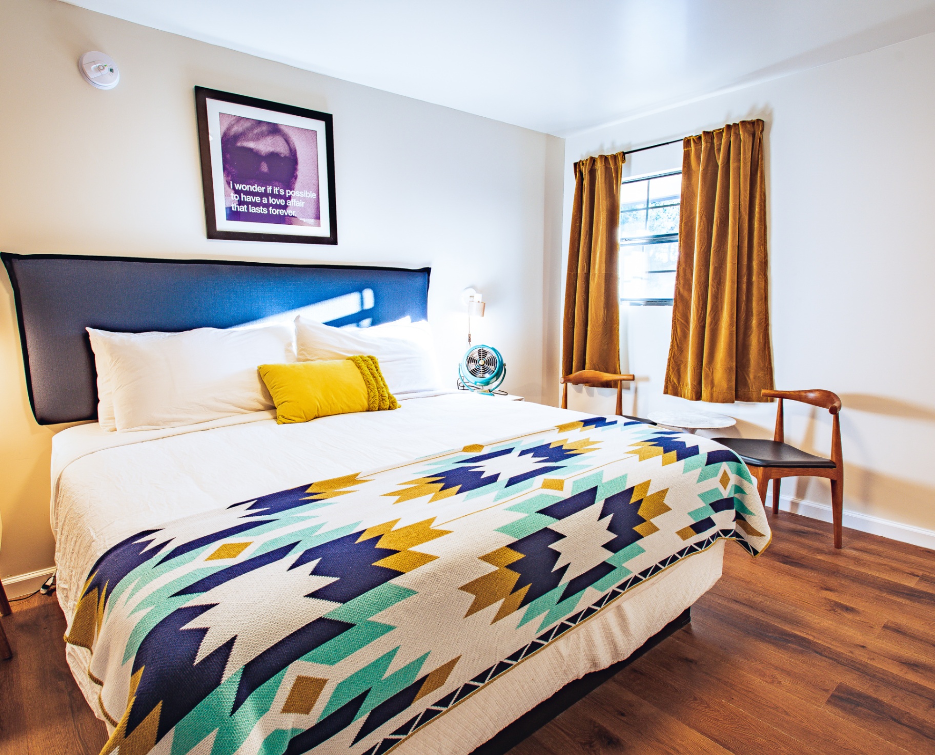 King room with mid-century decor and pop art